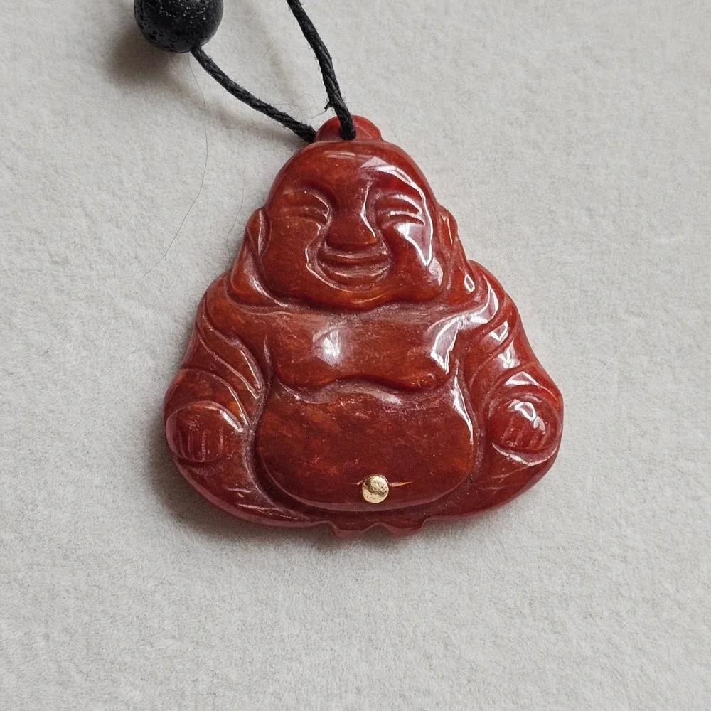 Carved Red Stone Laughing Buddha Pendant Black Cord Necklace Gold Tone Accent